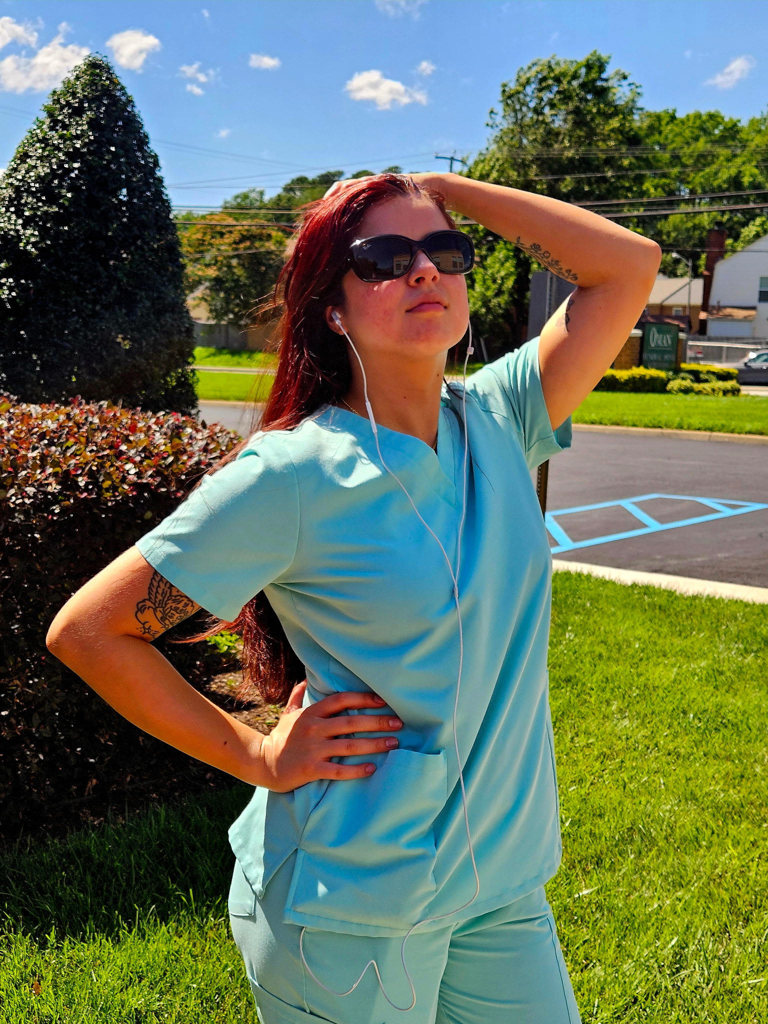 Navigation Eye Care team member wearing UV sunglasses for family sunglasses.