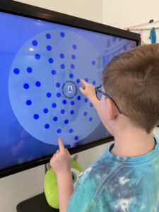 Child seen in Navigation Eye Care doing comprehensive eye exams for children