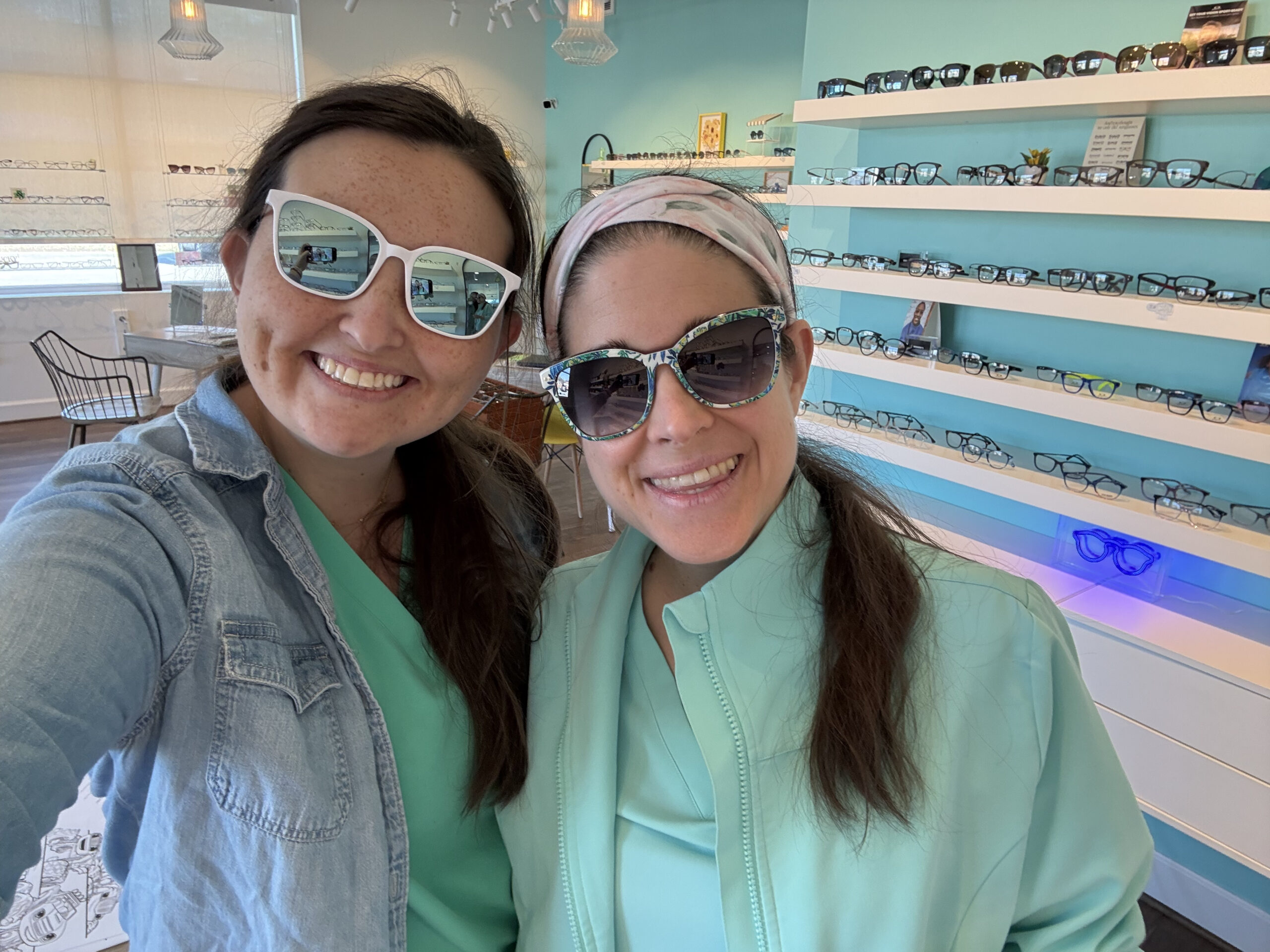 Navigation Eye Care team showcasing their sunglasses