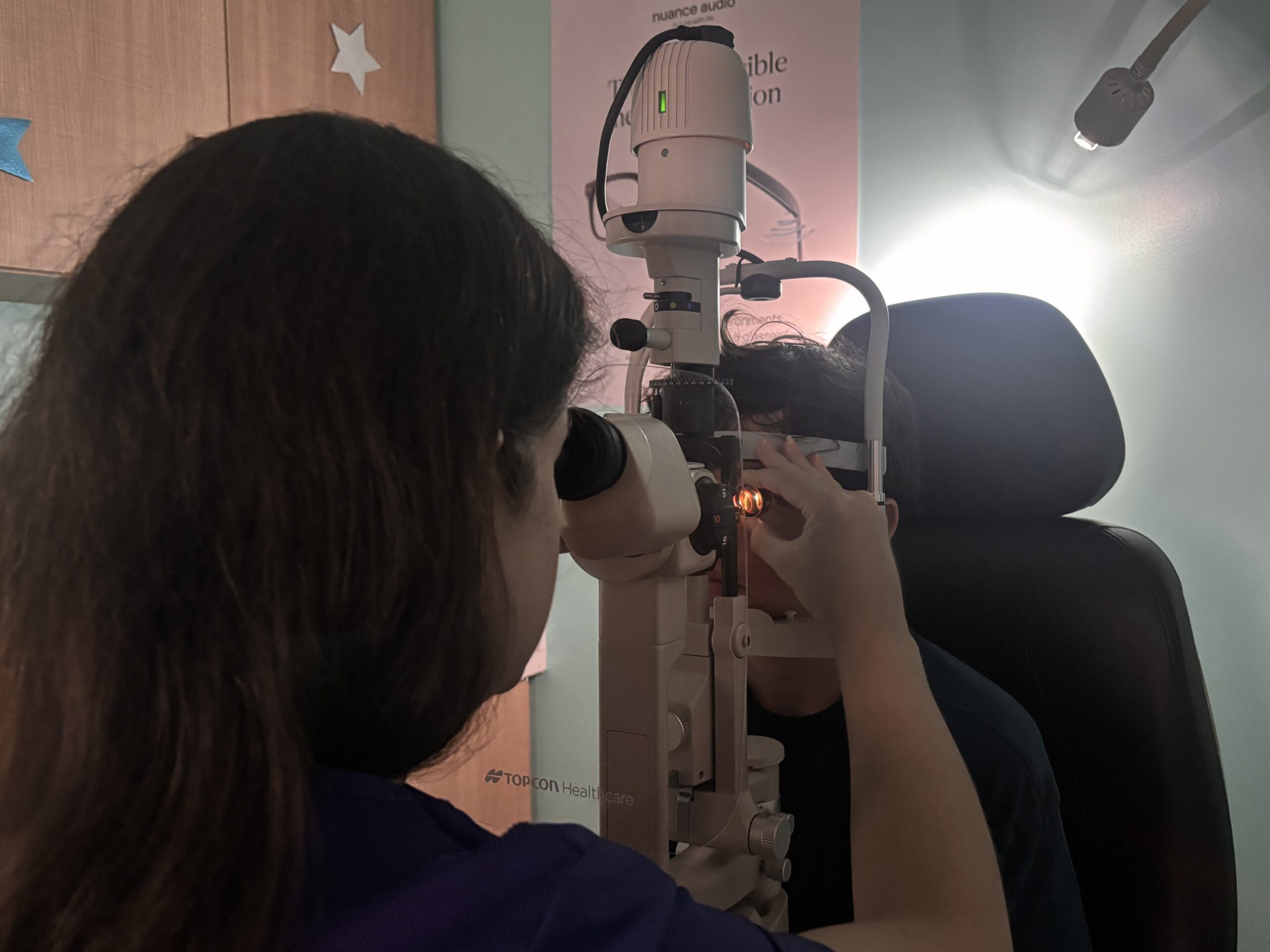Child seen in Navigation Eye Care with en eye doctor doing comprehensive eye exam for pediatric eye exams