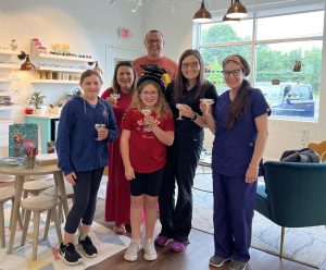Navigation Eye Care team with patients at the optical boutique in Chesapeake VA
