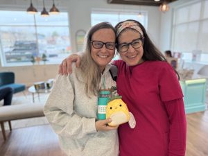 Happy patient celebrating after eye exam at Navigation Eye Care Chesapeake VA