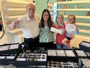 Family choosing eyewear frames at Navigation Eye Care optical boutique in Chesapeake VA