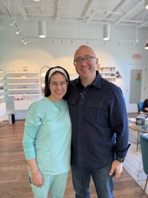 Dr. Teten and a satisfied patient at Navigation Eye Care optical boutique in Chesapeake VA