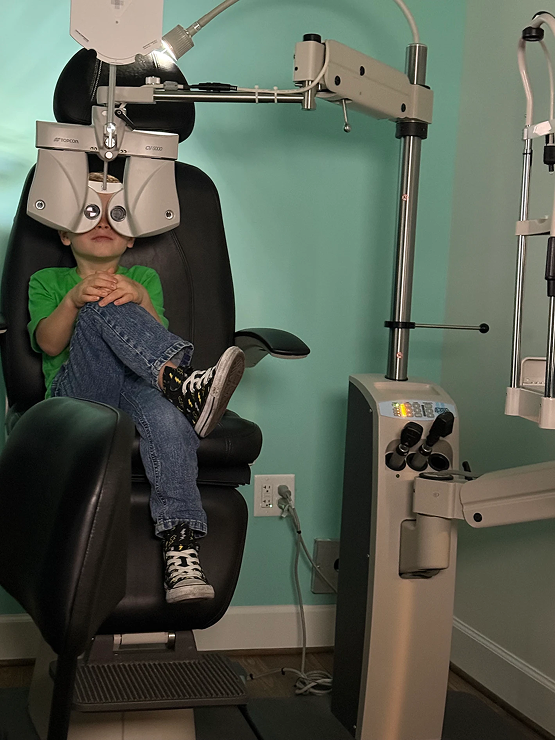 Dr. Teten consulting with patient during eye exam Navigation Eye Care Chesapeake"