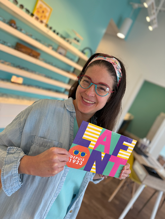 Dr. Amber Teten OD holding Lafont eyewear catalog at Navigation Eye Care Chesapeake VA optometrist and blog author